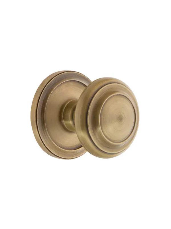 High Quality Grandeur Circulaire Rosette Door Set with Circulaire Knobs - Antique Brass - Privacy - 2 3/4
